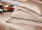 High-quality 1200TC cotton satin bedding with intricate champagne damask patterns and couture trim borders