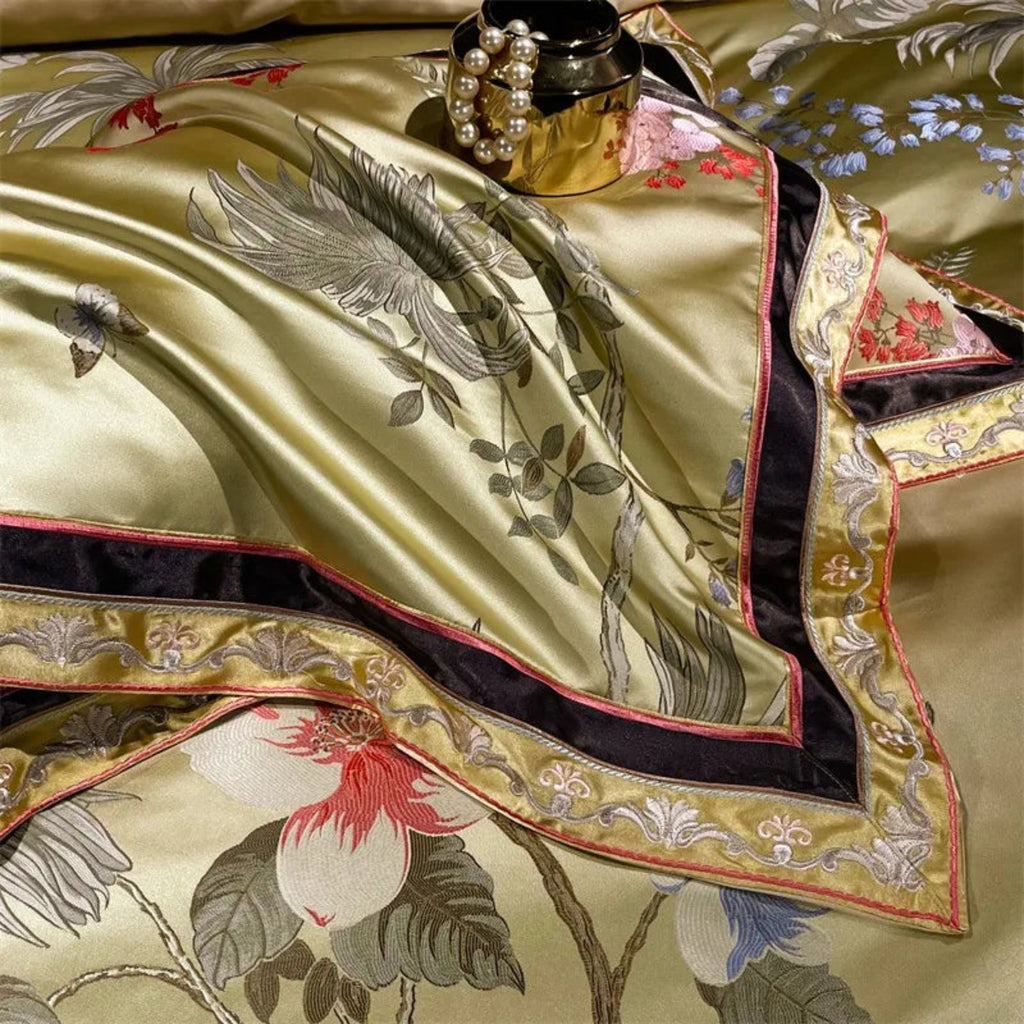 Gold satin pillow shams with embroidered floral motifs and piped edges, close-up, LINKORI