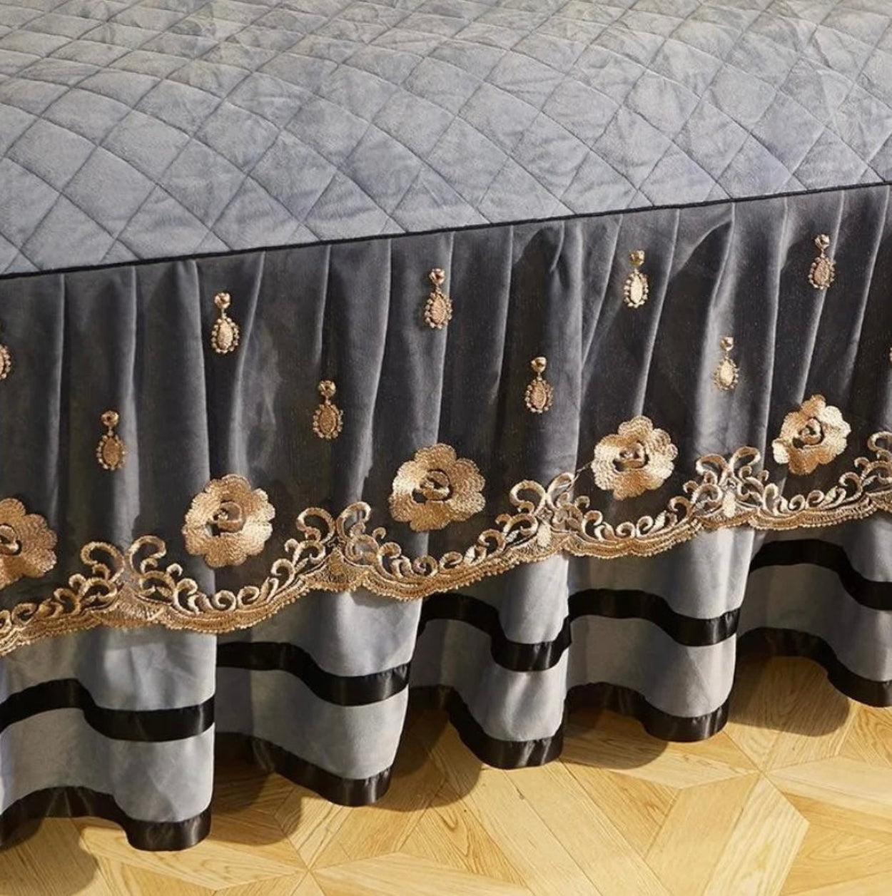 Embroidered silver grey velvet bedding with intricate golden florals, sophisticated bedroom design