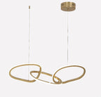 3 floating rings in modern gold — a sculptural LED chandelier perfect for dining rooms and Art Deco interiors. 