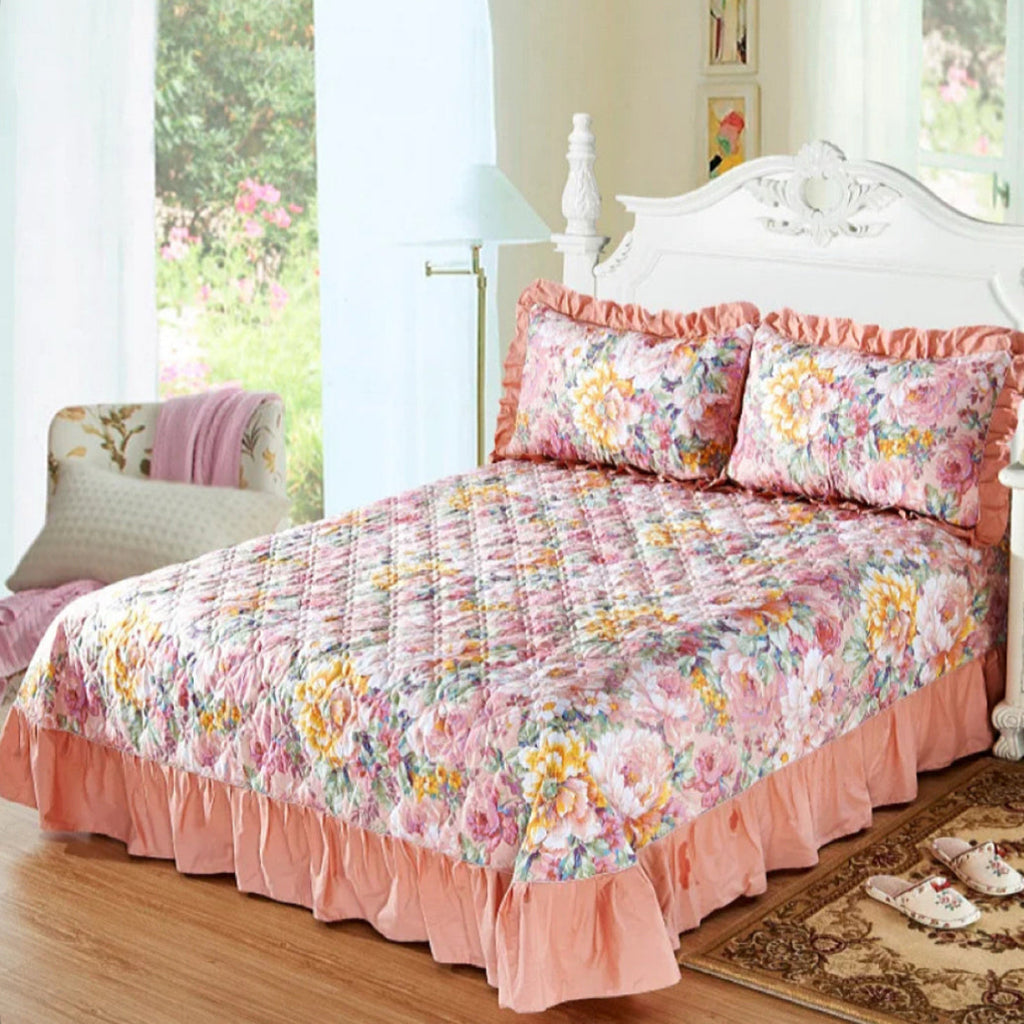 Quilted Floral bedspread in romantic bedroom with peach and coral rose floral duvet cover set, ruffled cotton bedding