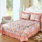 Quilted Floral bedspread in romantic bedroom with peach and coral rose floral duvet cover set, ruffled cotton bedding