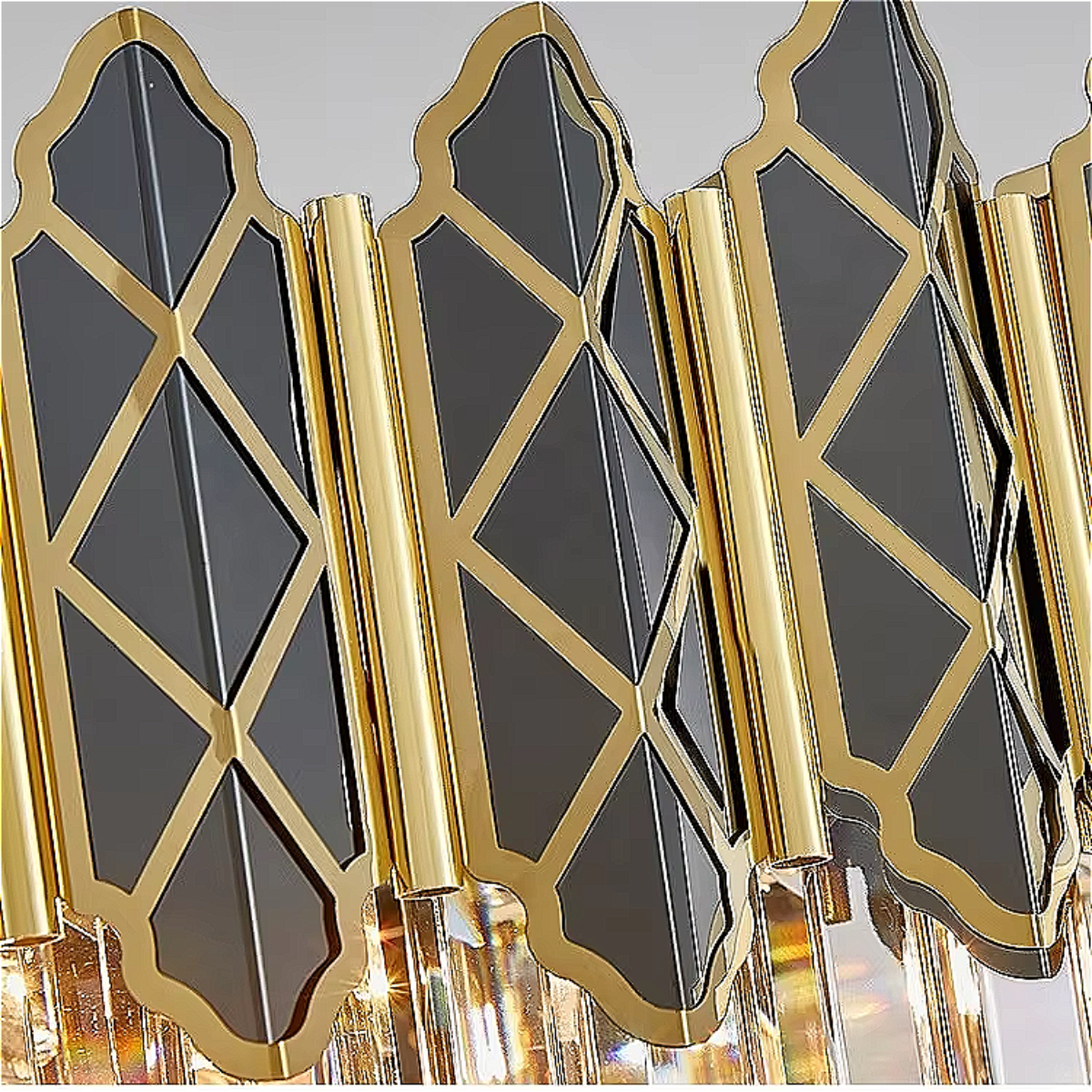 Art Deco gold chandelier with angular crystal prisms above dining room table creating dramatic ambient lighting for entertaining and formal dining spaces