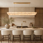 Spanish alabaster rectangular chandelier above a natural stone kitchen island in a warm organic modern kitchen – LINKORI BASPEAQ