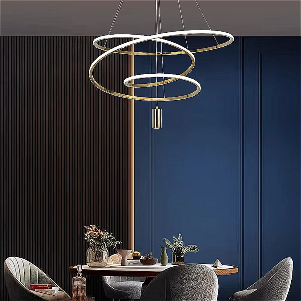 Classic dining room with gold 3-ring LED chandelier over table — modern ring pendant complements traditional décor, even illumination | LINKORI BLANGCHI