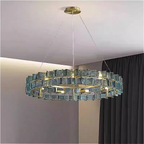 Chandelier hanging in a contemporary living room – LINKORI PRUTIKE glass and gold pendant with modern elegance