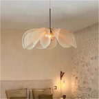 Lotus petal pendant chandelier above earth-toned Japandi bedroom – organic lighting for natural calm ambiance | LINKORI PETALIQ Embrace