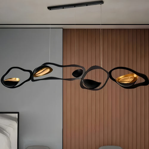 sculptural wave chandelier black gold ripple LED pendant light over modern dining table, statement modern art lighting by LINKORI MONGLIC WAVE