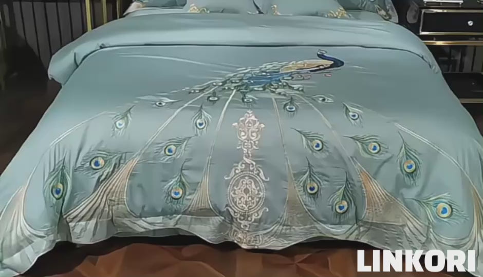 Video of LINKORI Drupoke luxury bedding showcasing detailed peacock embroidery and silky Egyptian cotton finish.