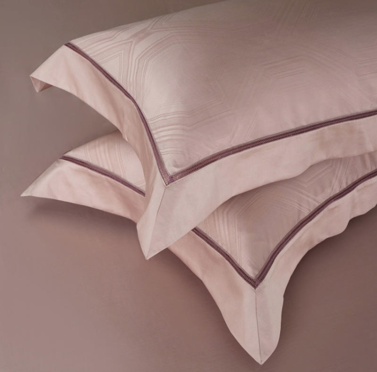 Pink satin pillow and duvet set on matching pink flat sheet – modern romantic bedding style for Japandi and elegant interiors | LINKORI, styled detail view