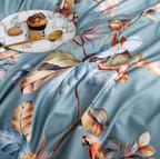 Detailed close-up of parrot and botanical motif on tropical duvet cover in blue – LINKORI Livelic Egyptian cotton bedding