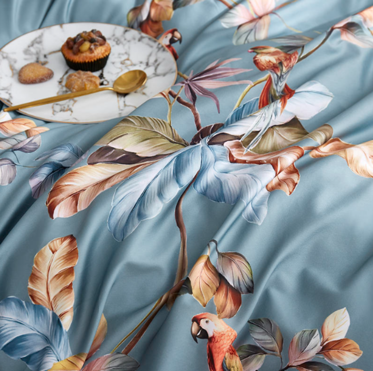 Detailed close-up of parrot and botanical motif on tropical duvet cover in blue – LINKORI Livelic Egyptian cotton bedding