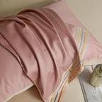 Beige flat sheet with pink satin pillow set – modern color contrast, clean piped detailing | LINKORI, pillow highlight