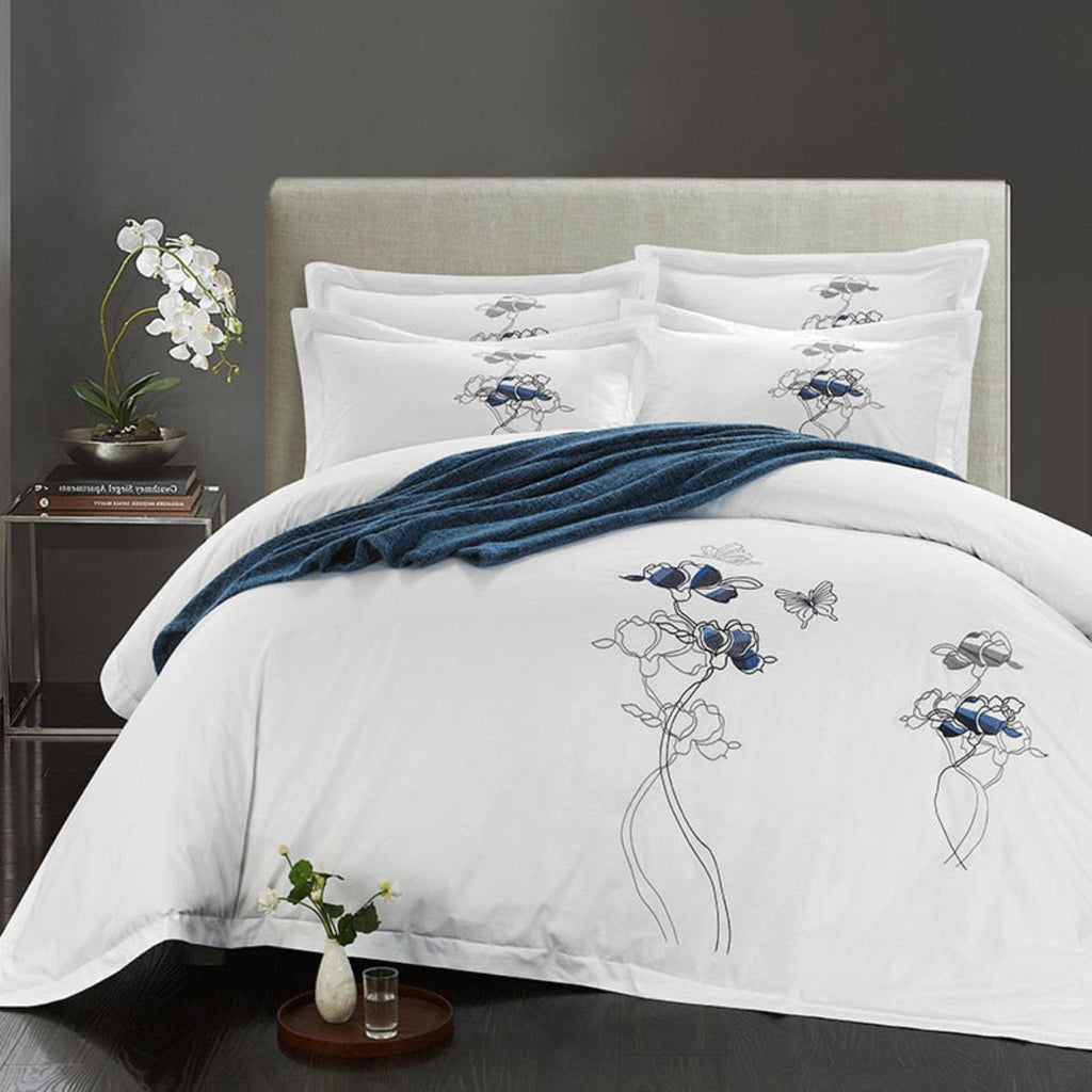 LINKORI Opisera 4-piece navy floral duvet cover set in white, crafted in 100% Egyptian cotton with minimalist elegance

