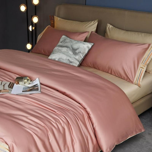 Blush pink satin bedding – elegant 4-piece duvet set on minimalist beige bed | LINKORI, side view