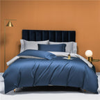 Contemporary interior blue grey reversible bedding set 4-piece — luxury Egyptian cotton with dual-tone design.