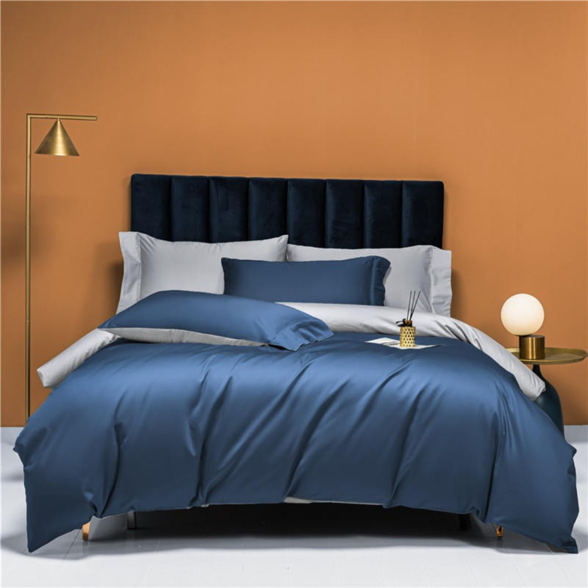 Contemporary interior blue grey reversible bedding set 4-piece — luxury Egyptian cotton with dual-tone design.