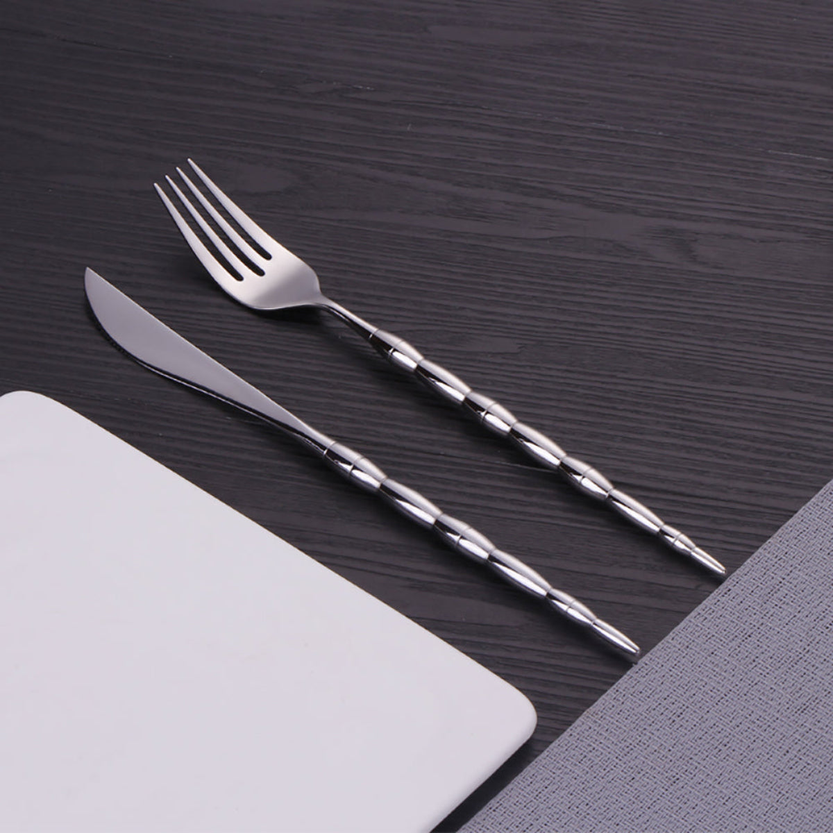  silver cutlery featuring 304 stainless steel construction with decorative beaded stems and sleek contemporary styling