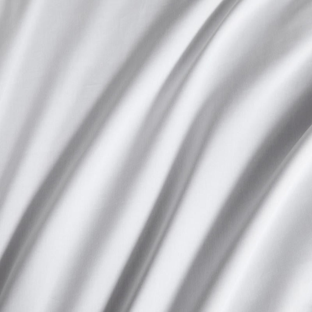  Macro detail of silky Egyptian cotton duvet cover — showing 600TC weave and soft satin sheen.