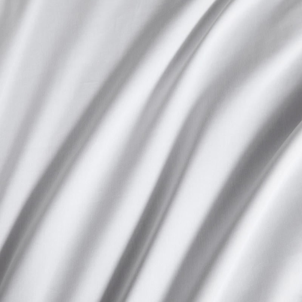  Macro detail of silky Egyptian cotton duvet cover — showing 600TC weave and soft satin sheen.