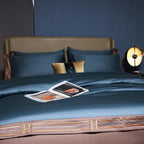 Blue Satin Egyptian duvet cover set with matching trim and sheet in modern bedroom