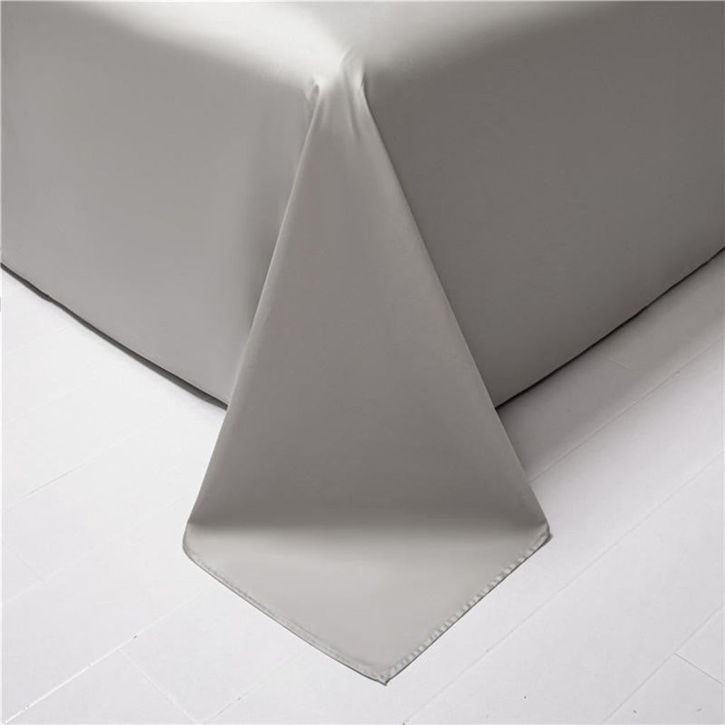 Grey flat sheet hem detail close-up — matching design in luxury blue grey reversible duvet cover set.