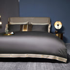 grey satin-finish duvet cover set with cream-gold trim in modern interior, detail focus on border design | LINKORI Grey Satin
