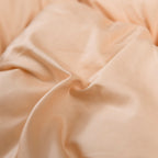 Textural close-up of beige cotton comforter fabric – 600 thread count cotton with silky smooth finish | LINKORI
