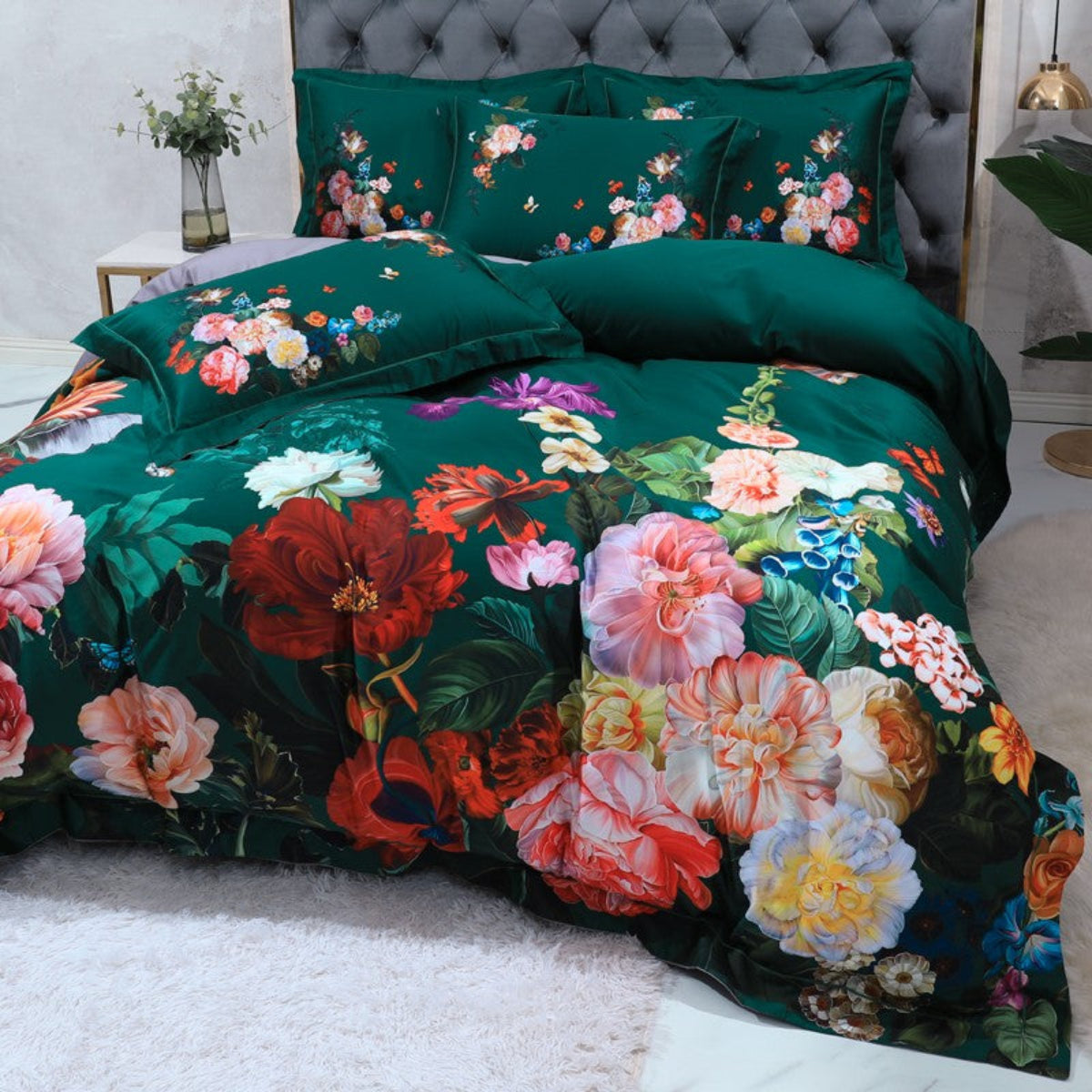 Artistic angled view of bold botanical duvet set in deep green with colorful blooming floral design – luxury maximalist bedding