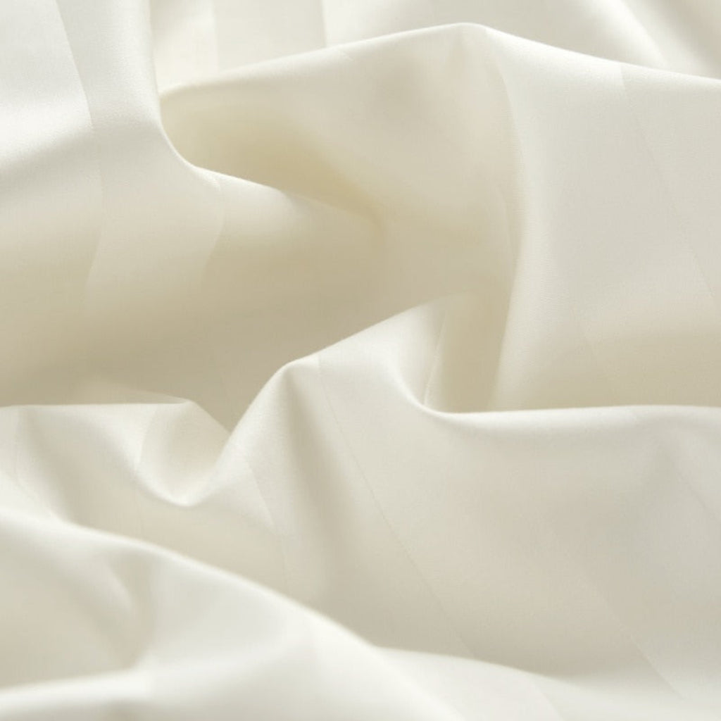 Close-up detail of the 100% Egyptian cotton duvet cover fabric, showing the smooth texture and breathable 400-thread count weave.