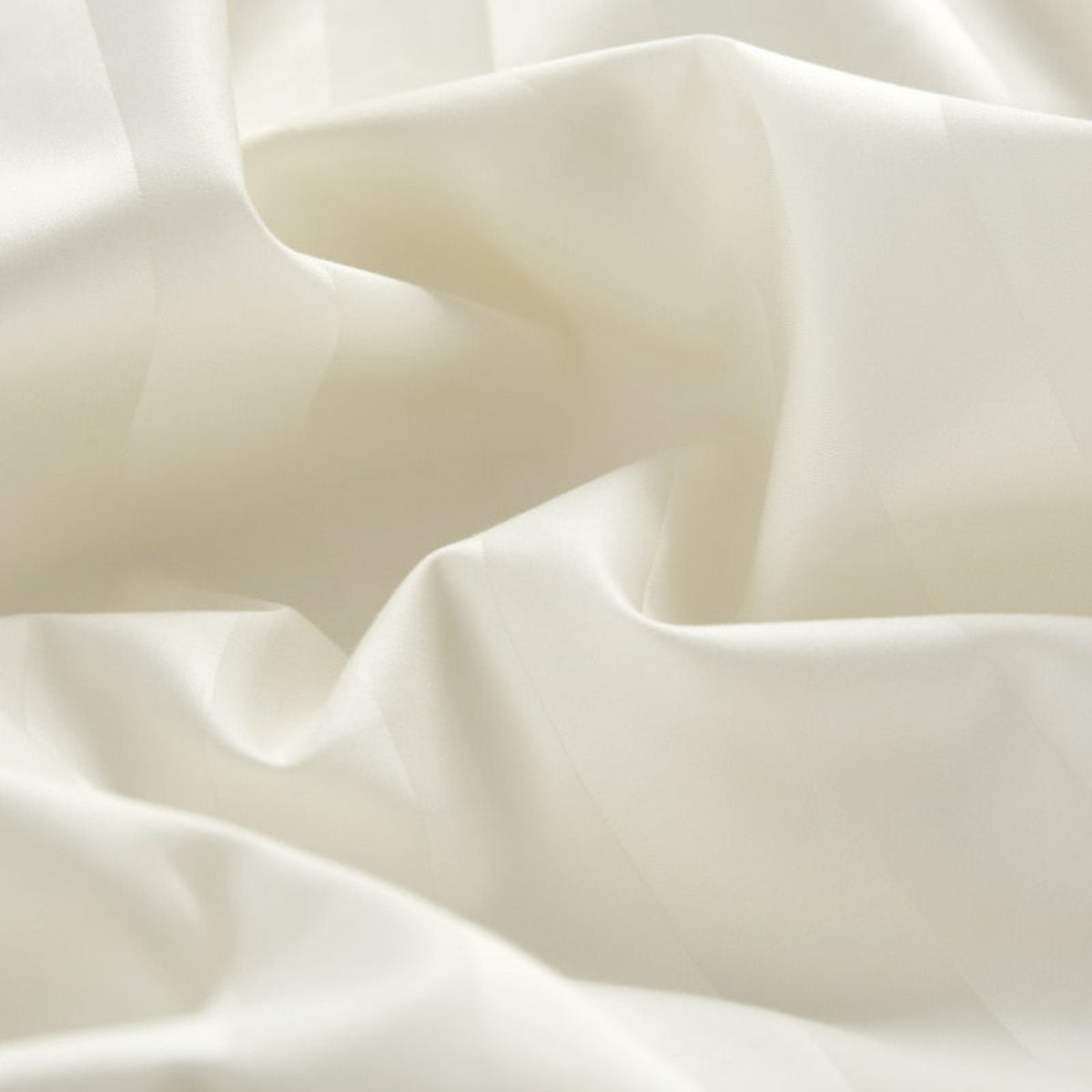 Close-up detail of the 100% Egyptian cotton duvet cover fabric, showing the smooth texture and breathable 400-thread count weave.