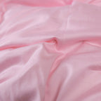 Fabric texture shot – smooth, 600+ thread count cotton with a gentle sheen and airy loft