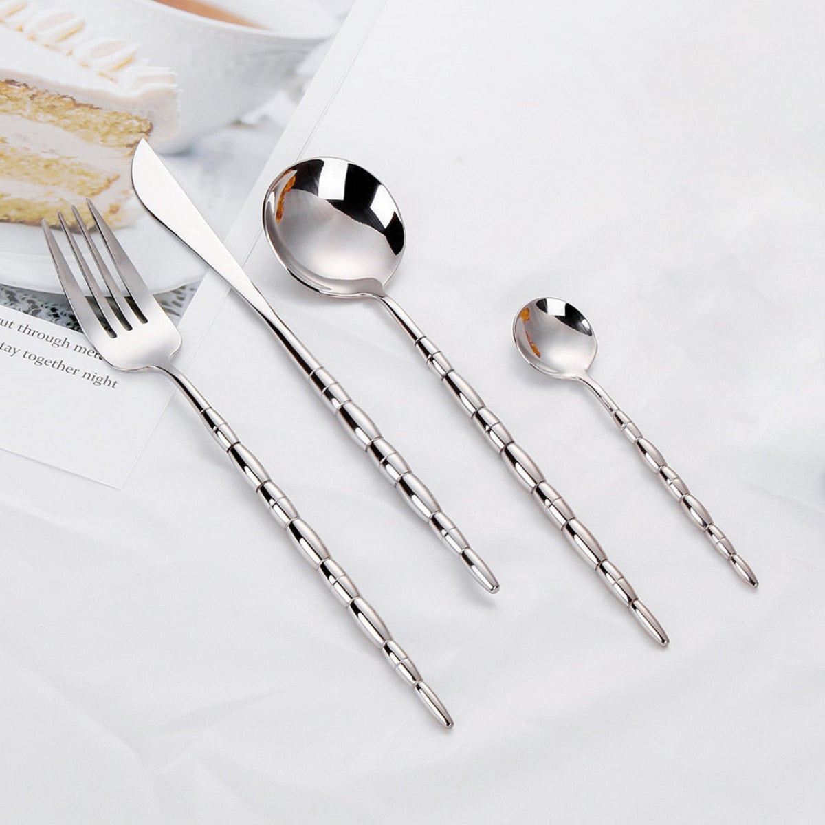 LINKORI Patti Silver cutlery set with beaded handles featuring dinner knife, fork, spoon and teaspoon in mirror-polished stainless steel finish