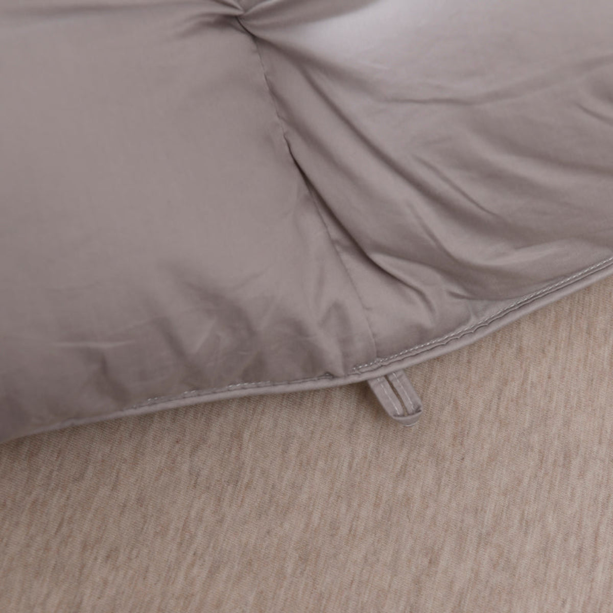 stitched edge close-up on grey goose down comforter premium finish in breathable cotton shell | LINKORI Grey Luxurious