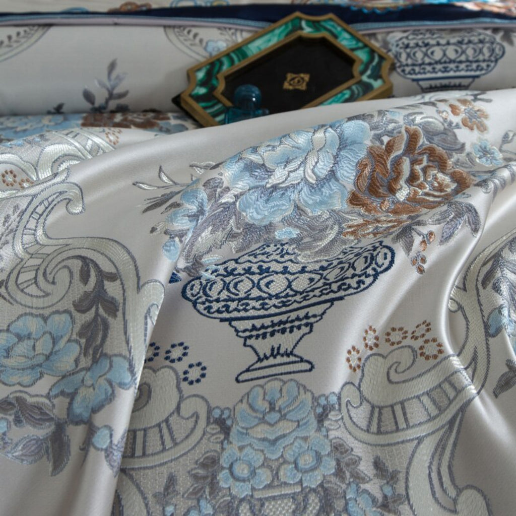 Close-up of floral embroidery on LINKORI Highclatan duvet cover – blue and beige satin jacquard detailing