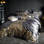 Side angle of grey Egyptian cotton duvet cover set with gold embroidery, showcasing bed depth and baroque styling.