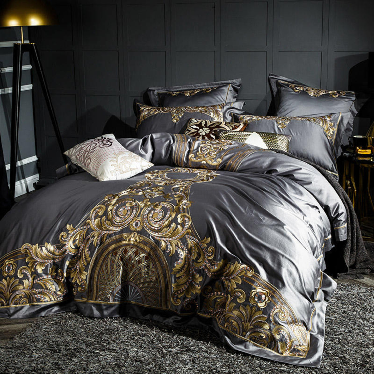 Side angle of grey Egyptian cotton duvet cover set with gold embroidery, showcasing bed depth and baroque styling.