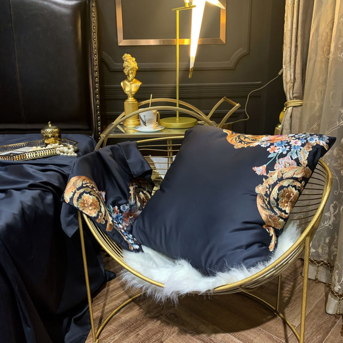 Single square pillow with vivid baroque embroidery, featuring floral and scroll motifs in gold, lilac, and rose tones.