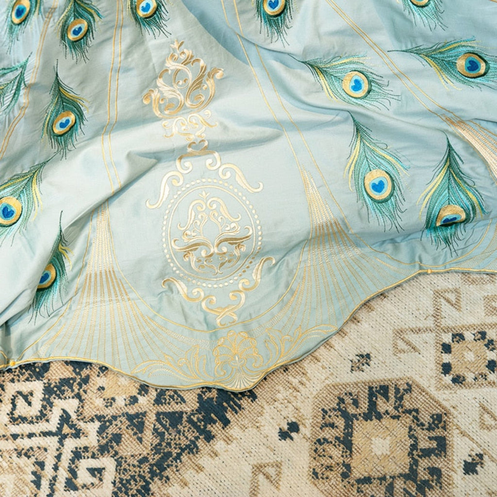 Intricate gold embroidery pattern detail on mint Egyptian cotton bedding from LINKORI Drupoke collection.
