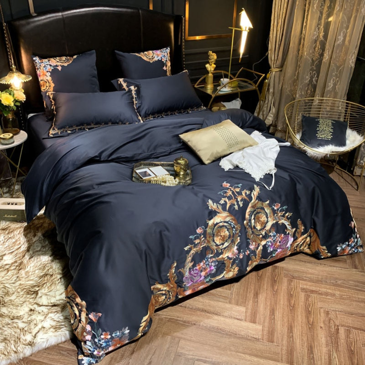 Side view of the Perik bedding set with ornate detailing and rich satin finish, styled in a moody luxury bedroom.
