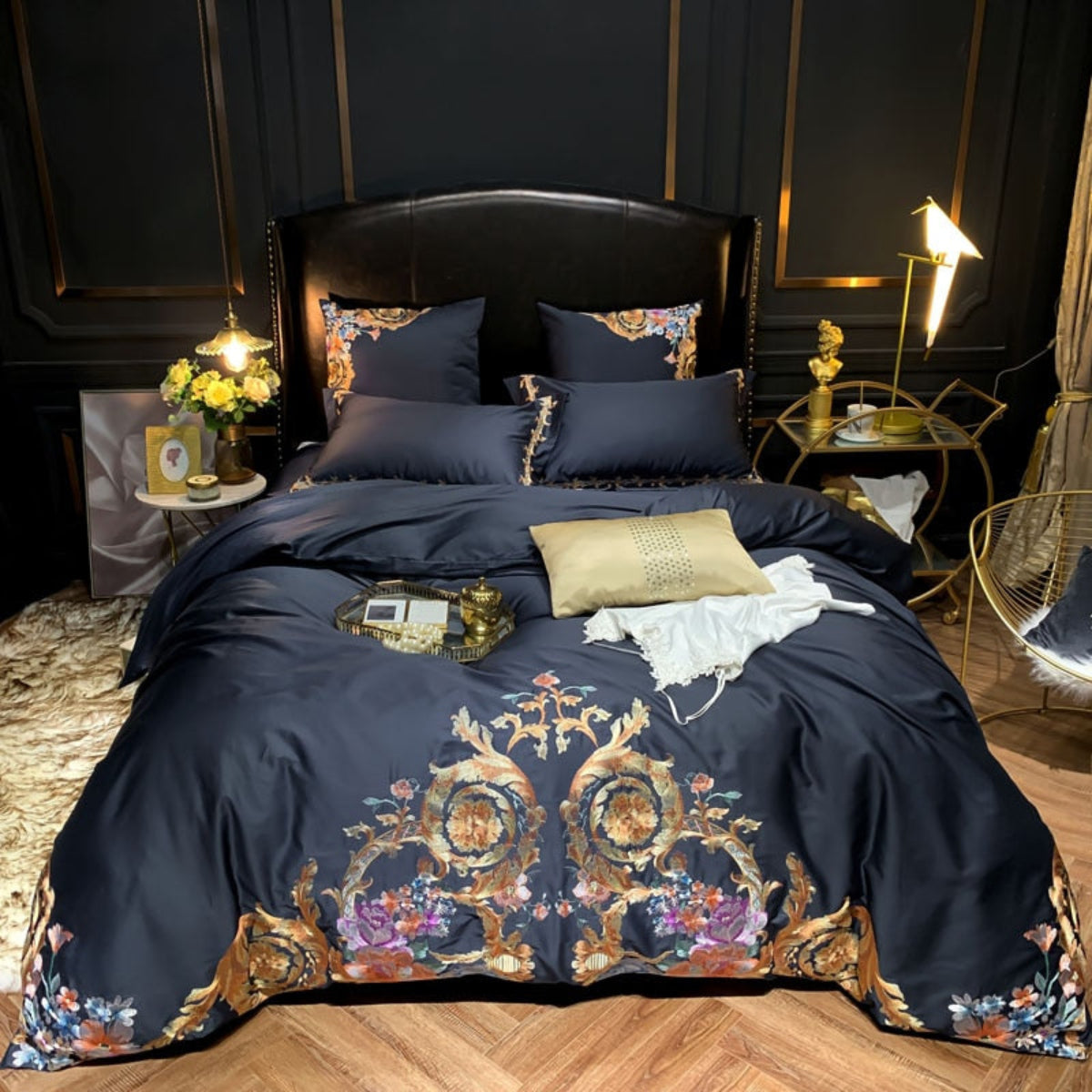 Full view of LINKORI Perik bedding set in black with floral baroque embroidery, styled in an elegant gold-accented bedroom.