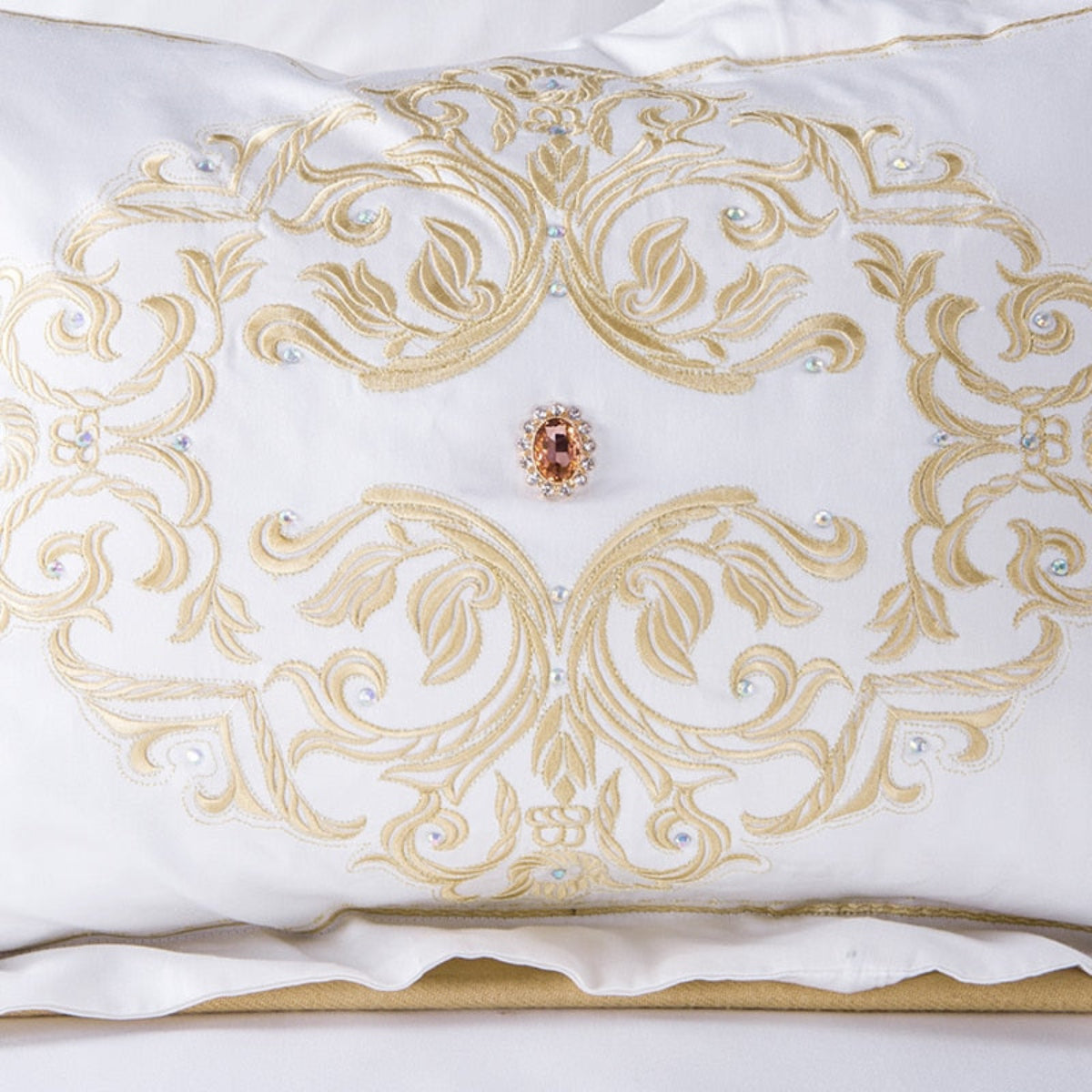 Close-Up of Pillowcase with Intricate Gold Embroidery and Ruby Accent – LINKORI Regal Bedding Detail