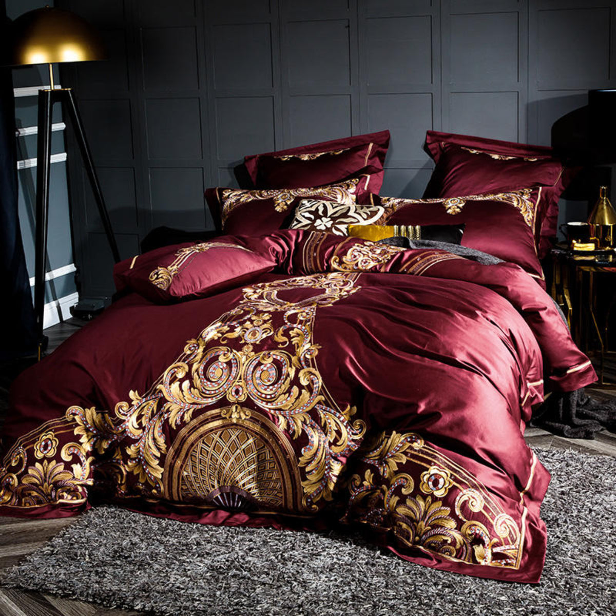 Side view of full LINKORI Zutapera bedding set – red embroidered duvet and layered cushions in regal setting