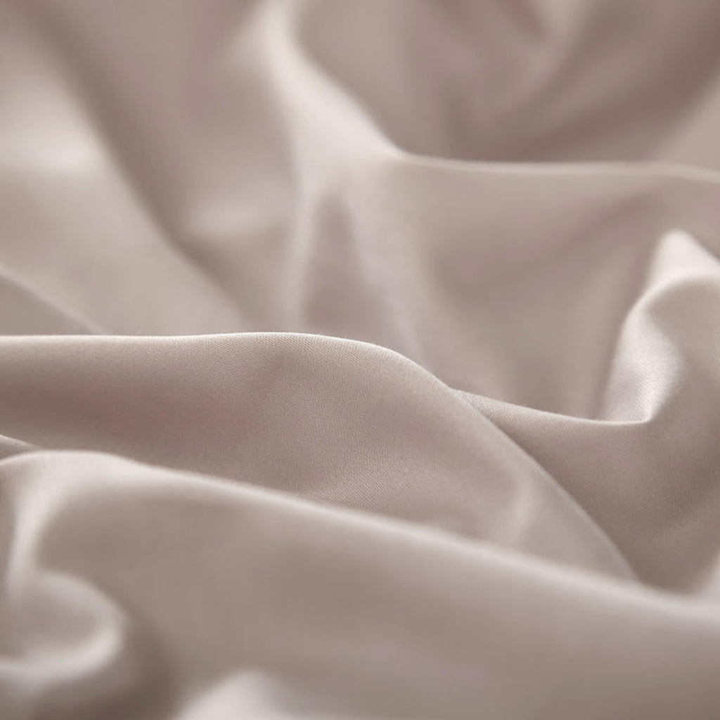 Detailed texture shot of the pink Egyptian cotton duvet cover, showing its smooth and breathable 600TC weave.