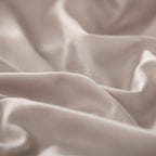Detailed texture shot of the pink Egyptian cotton duvet cover, showing its smooth and breathable 600TC weave.