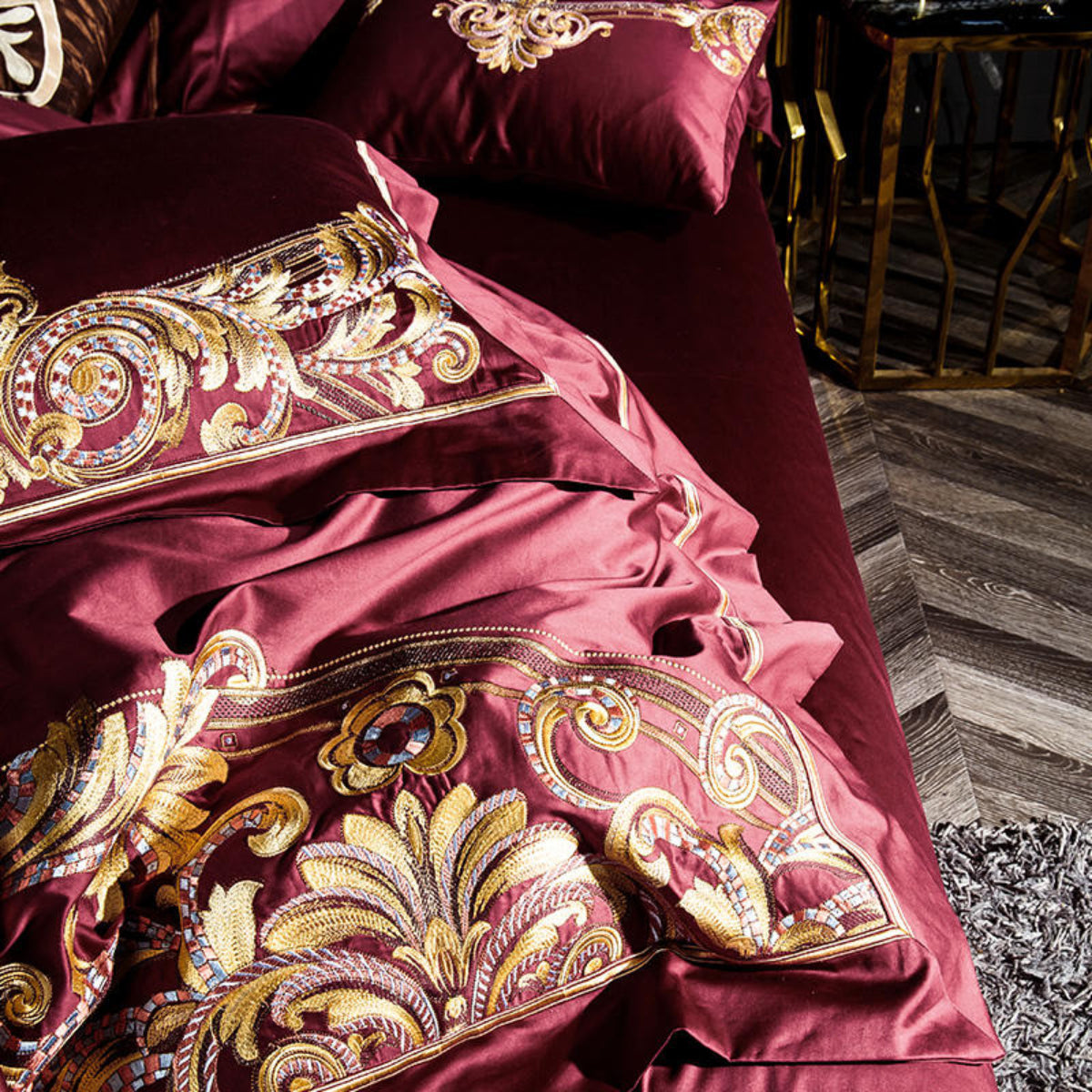 Macro view of gold embroidery on LINKORI Zutapera duvet and pillow – intricate palace-inspired pattern on silky cotton