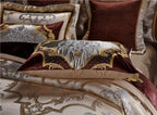 Three embroidered pillow designs styled on LINKORI Specto duvet – royal detailing with silk texture