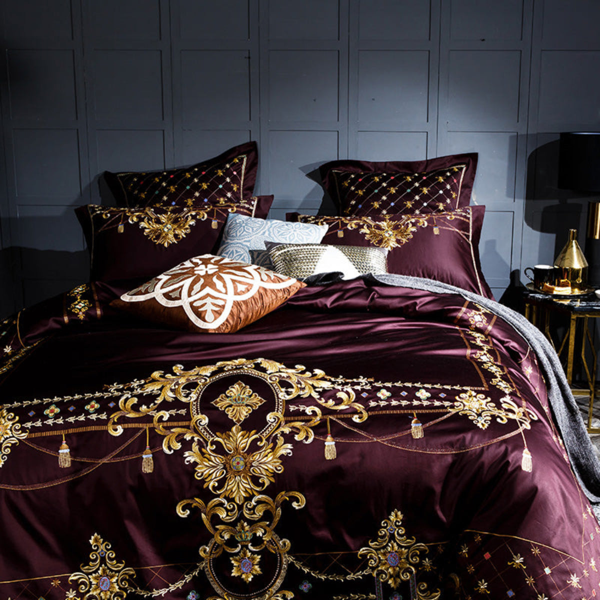 Angled full view of LINKORI Slivel S. R bedding set – opulent plum and gold embroidery on premium cotton