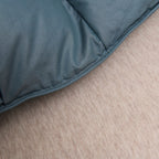 Close-up of edge finishing on LINKORI Blue Luxurious goose down comforter, showing precise seam stitching and high-quality craftsmanship.