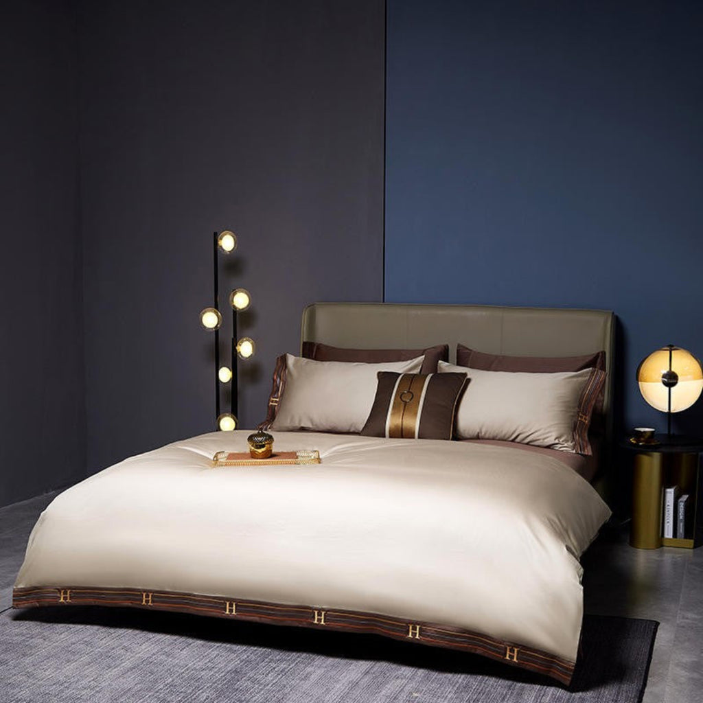 Side angle of full 4-piece satin bedding set in beige and brown tones – hotel-style modern bedding